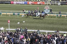 A 66-1 outsider, Auroras Encore, won the John Smith’s Grand National in front of a bumper 70,000 Aintree crowd.